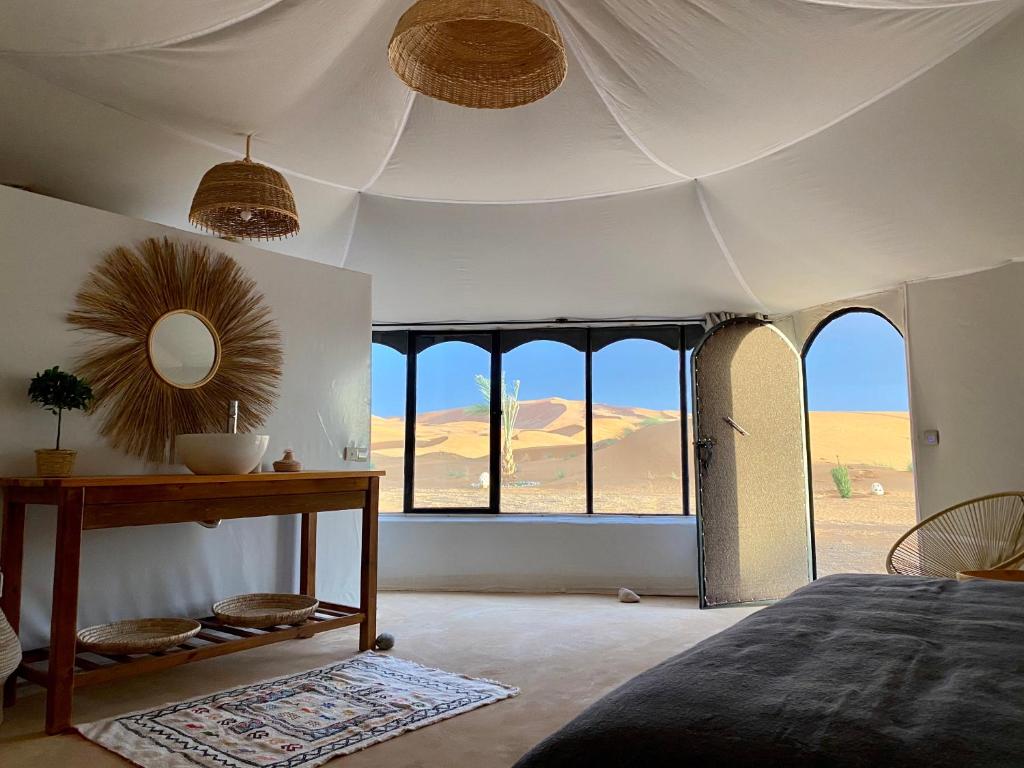Postel nebo postele na pokoji v ubytování Tuda Luxury Camp