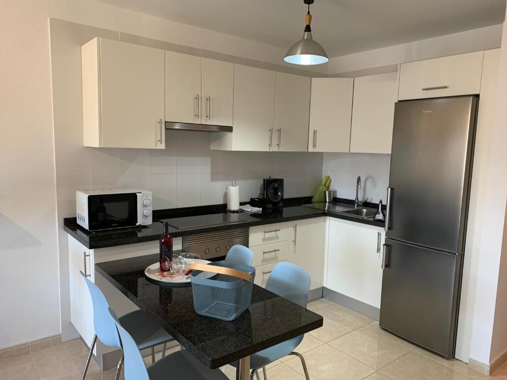 A kitchen or kitchenette at Maria Perla Medano