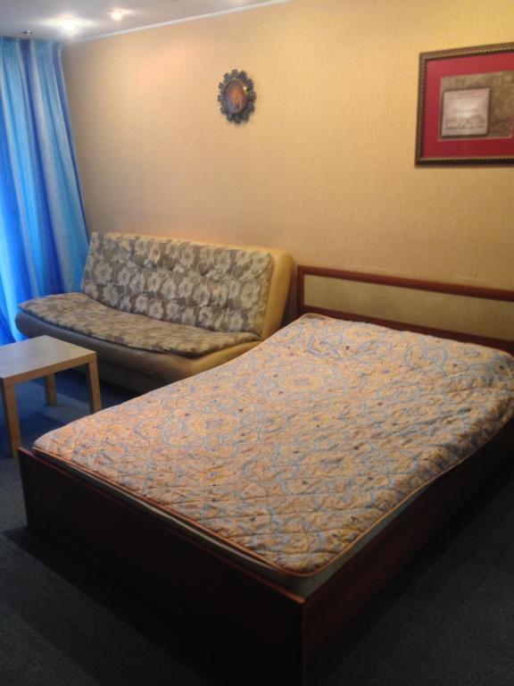 Un ou plusieurs lits dans un hébergement de l'établissement Apartment on Druzhby 4
