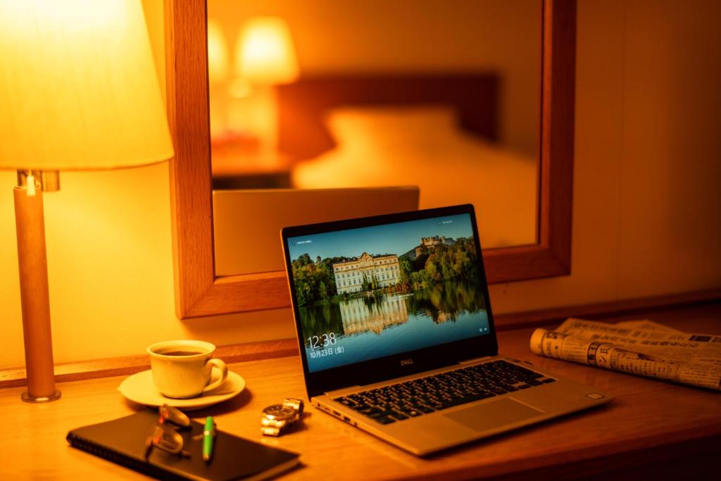 TV a/nebo společenská místnost v ubytování Hotel Io Alpheratz