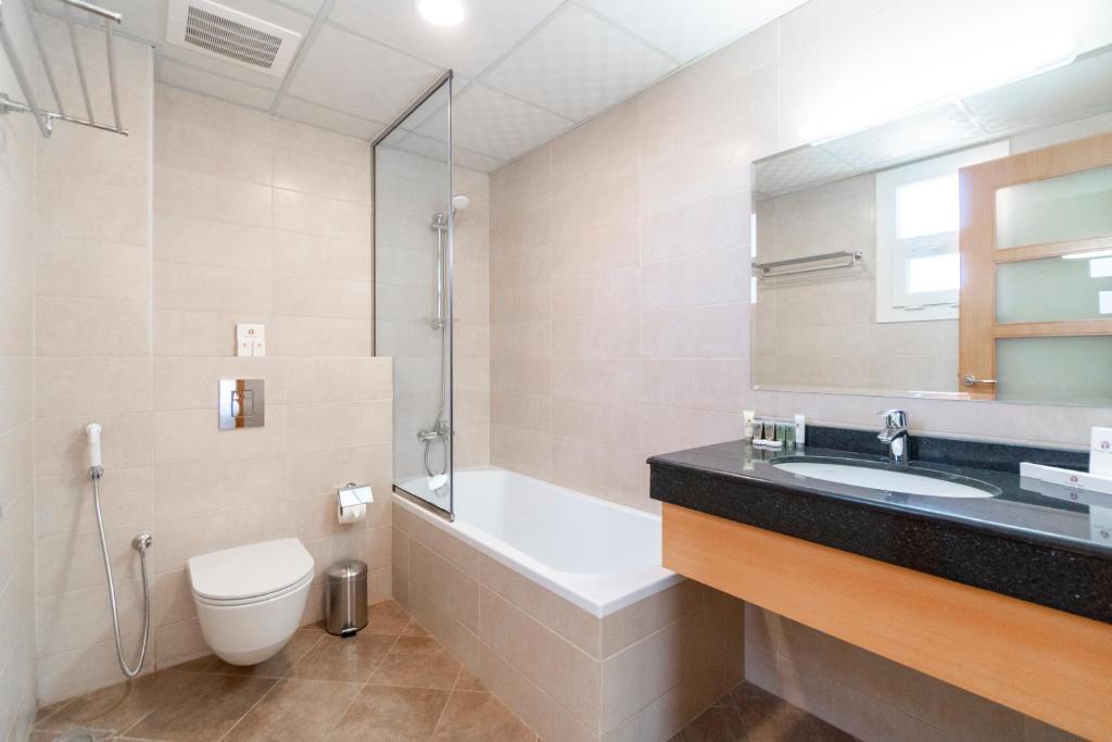 Koupelna v ubytování Sama Muscat Hotel