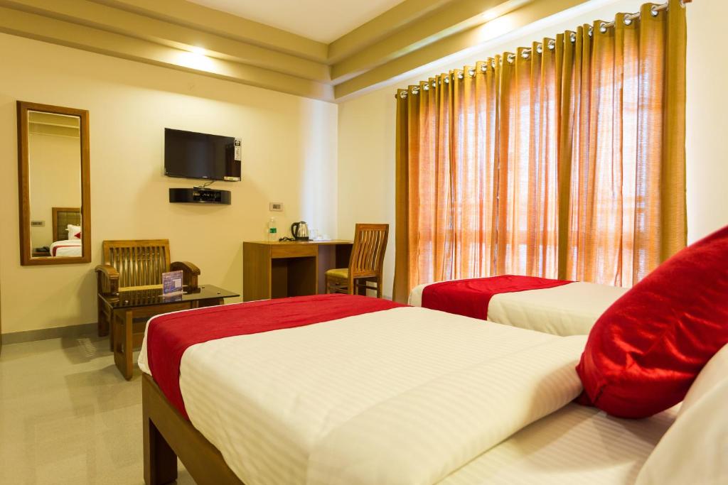 TV a/nebo společenská místnost v ubytování Hotel Garden Inn