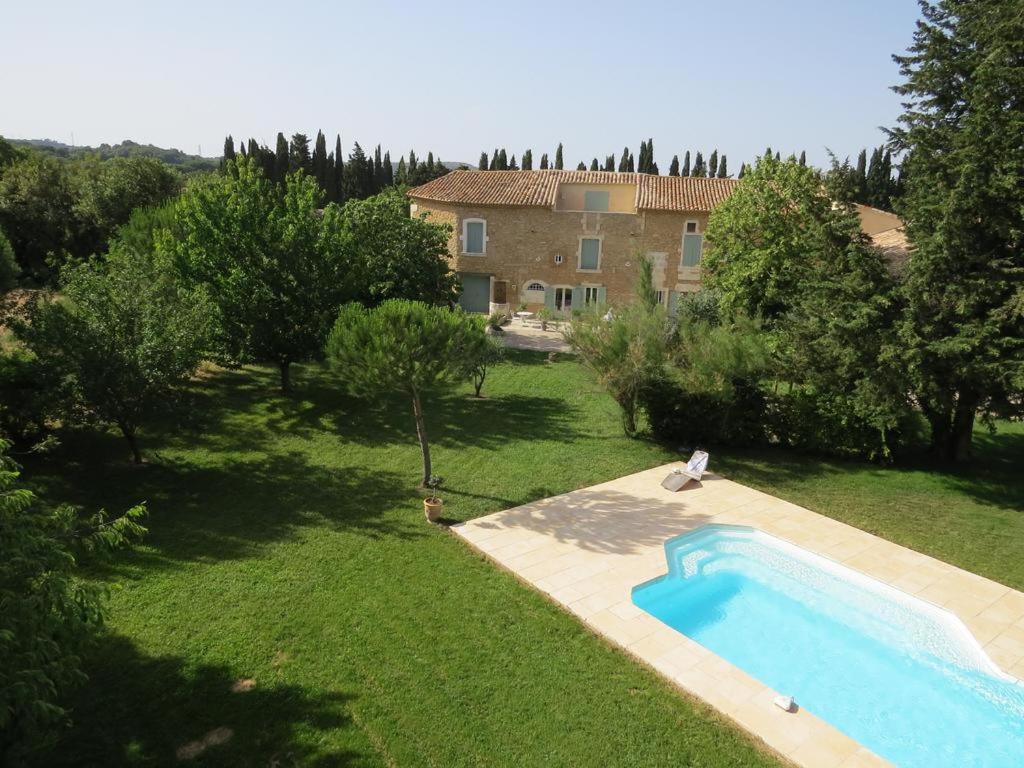 an aerial view of a yard with a swimming pool at Mas De Martinet in Meynes