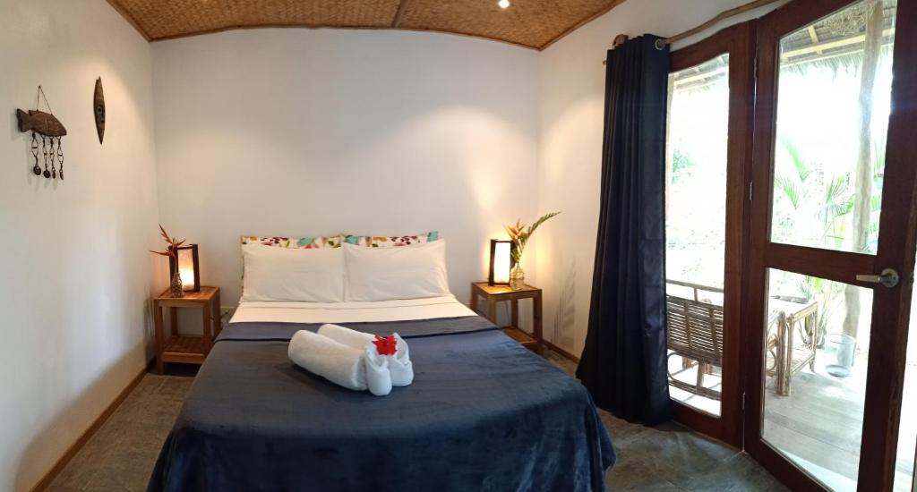 Postel nebo postele na pokoji v ubytování Valerie Lodge