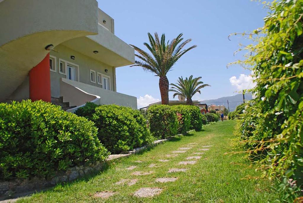 A garden outside Ermioni Hotel