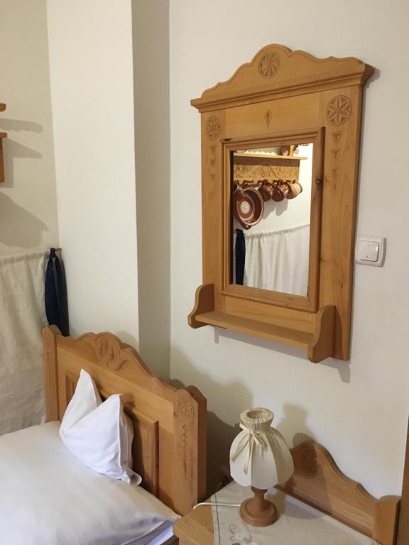 Postel nebo postele na pokoji v ubytování Bagolyvár Panzió