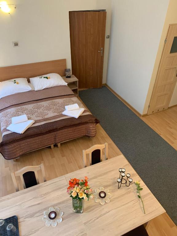 Postel nebo postele na pokoji v ubytování OW Meduza i Biala Mewa