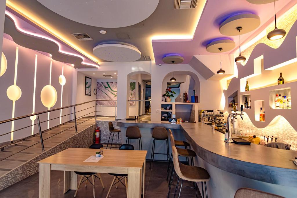 Posezení v ubytování N E P center Hotel Rodos