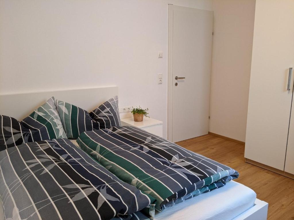 Postel nebo postele na pokoji v ubytování Ferienwohnung Bergzauber