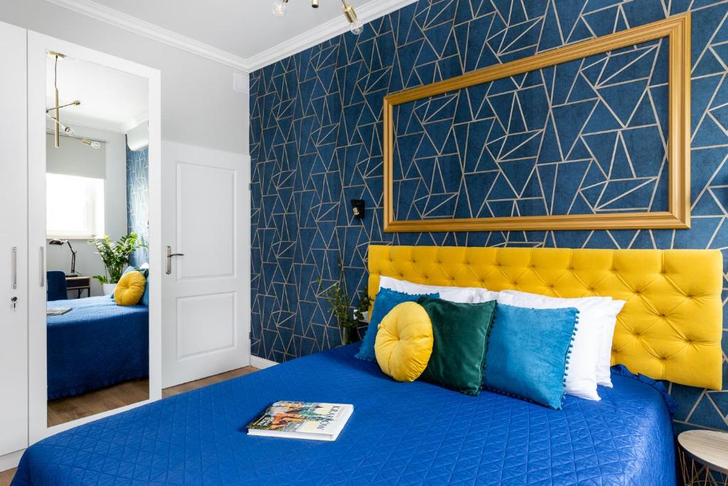 Posteľ alebo postele v izbe v ubytovaní Luxe Living Krakow