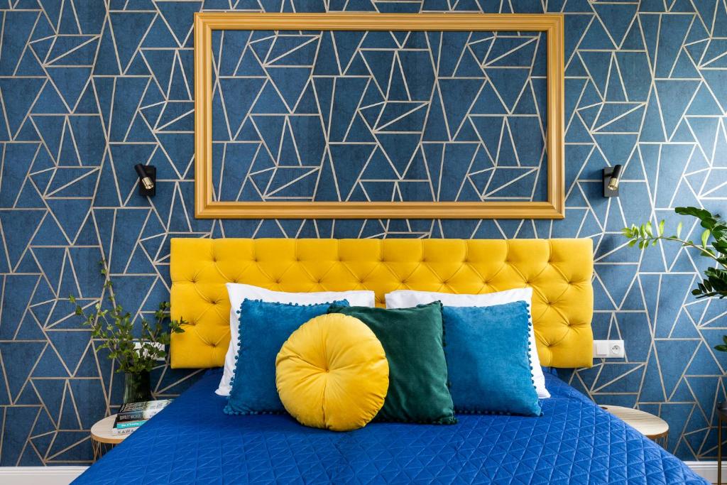 Posteľ alebo postele v izbe v ubytovaní Luxe Living Krakow