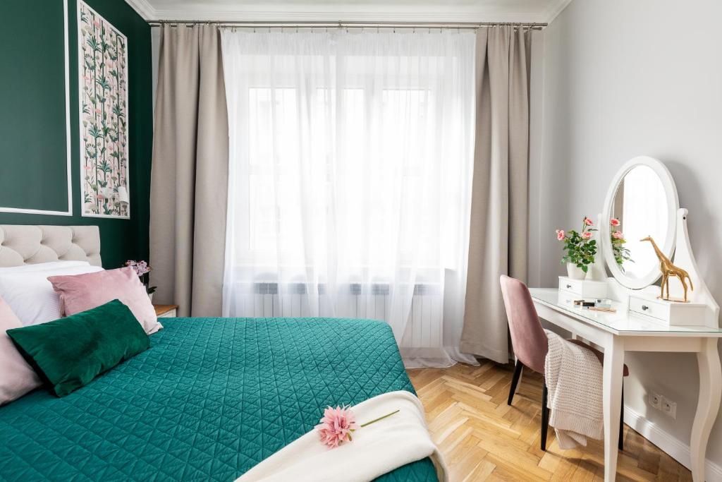 Posteľ alebo postele v izbe v ubytovaní Luxe Living Krakow
