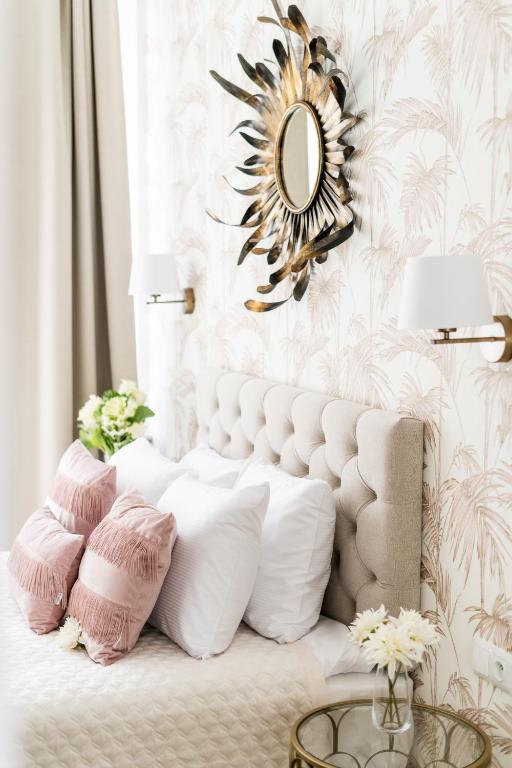 Posteľ alebo postele v izbe v ubytovaní Luxe Living Krakow