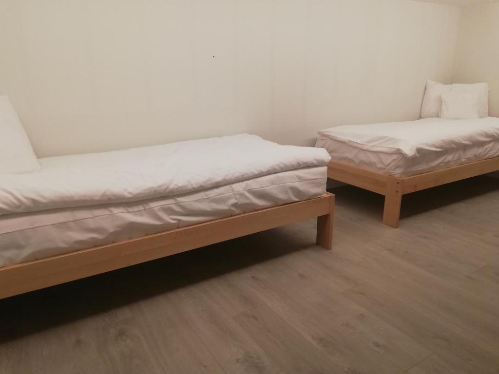Posteľ alebo postele v izbe v ubytovaní U ŹRÓDEŁ