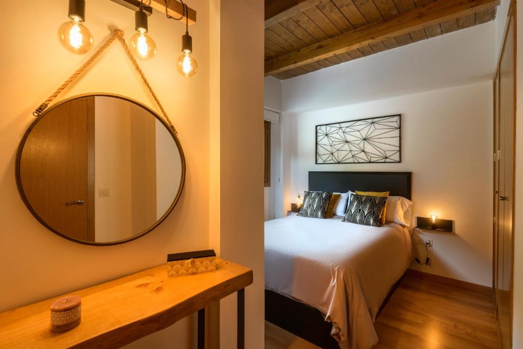Postel nebo postele na pokoji v ubytování Chalet Casa La Cumbrecita en Panticosa