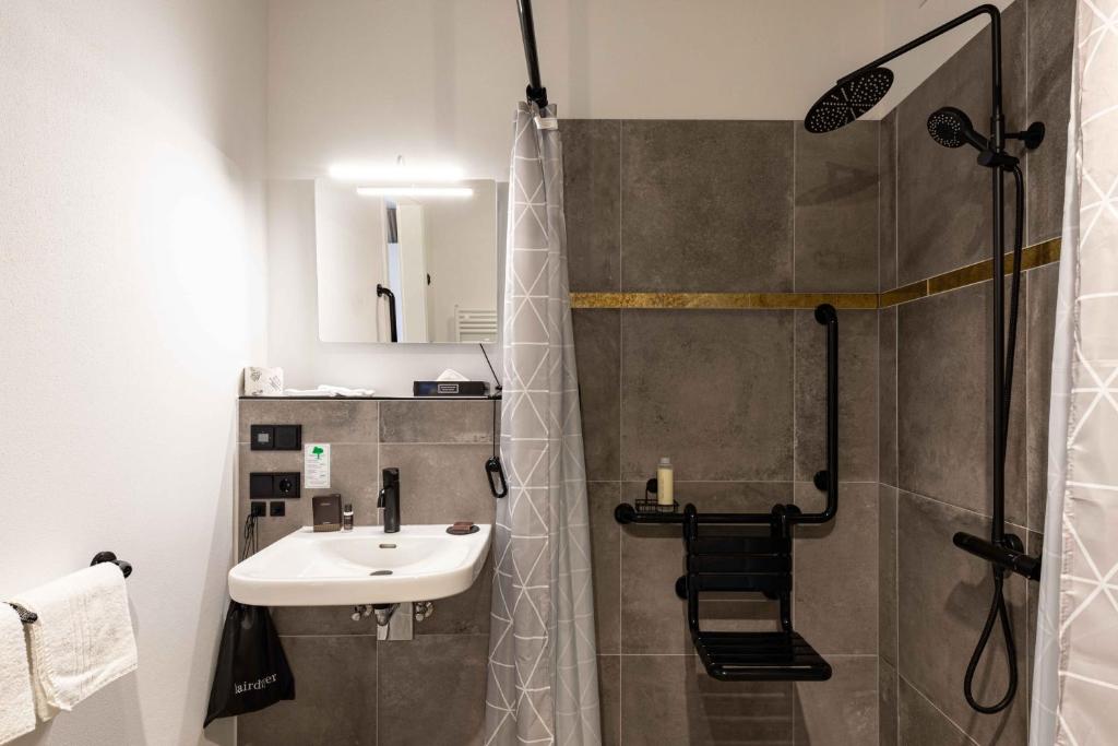 Koupelna v ubytování LÜTTES LOFT Boutique Hotel