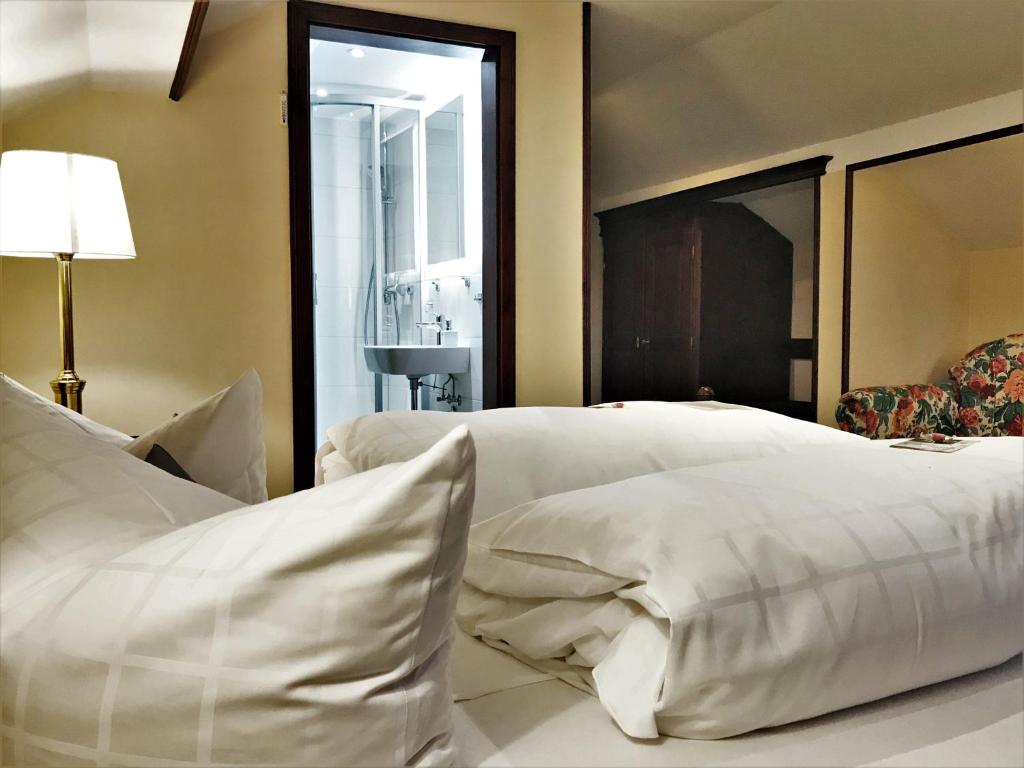 Voodi või voodid majutusasutuse Flair-Hotel Waldfrieden toas