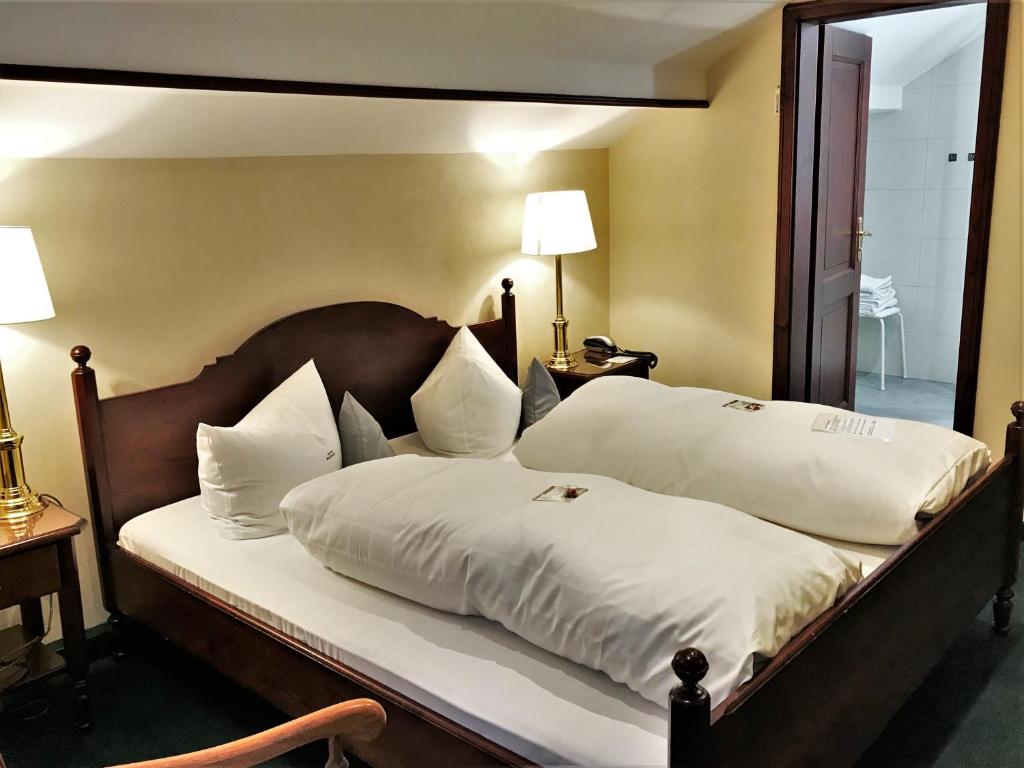 Voodi või voodid majutusasutuse Flair-Hotel Waldfrieden toas