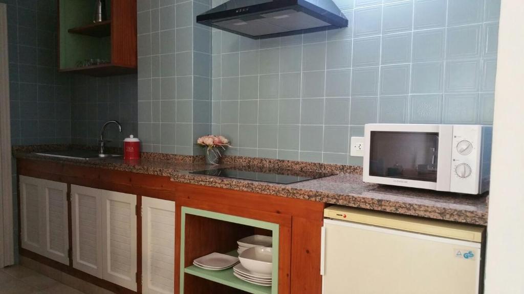Kuchyň nebo kuchyňský kout v ubytování Apartamentos Top Secret Es Pujols - Formentera Vacaciones