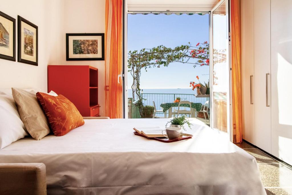 Posteľ alebo postele v izbe v ubytovaní Appartamento Terrazza DA...Mare