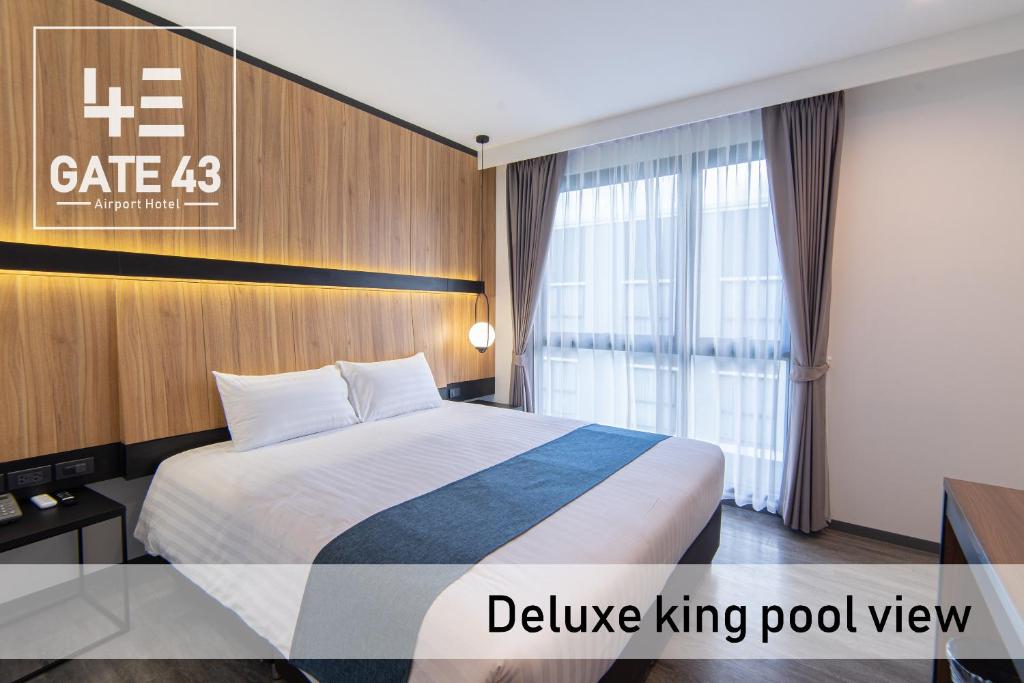Postel nebo postele na pokoji v ubytování Gate43 Airport Hotel