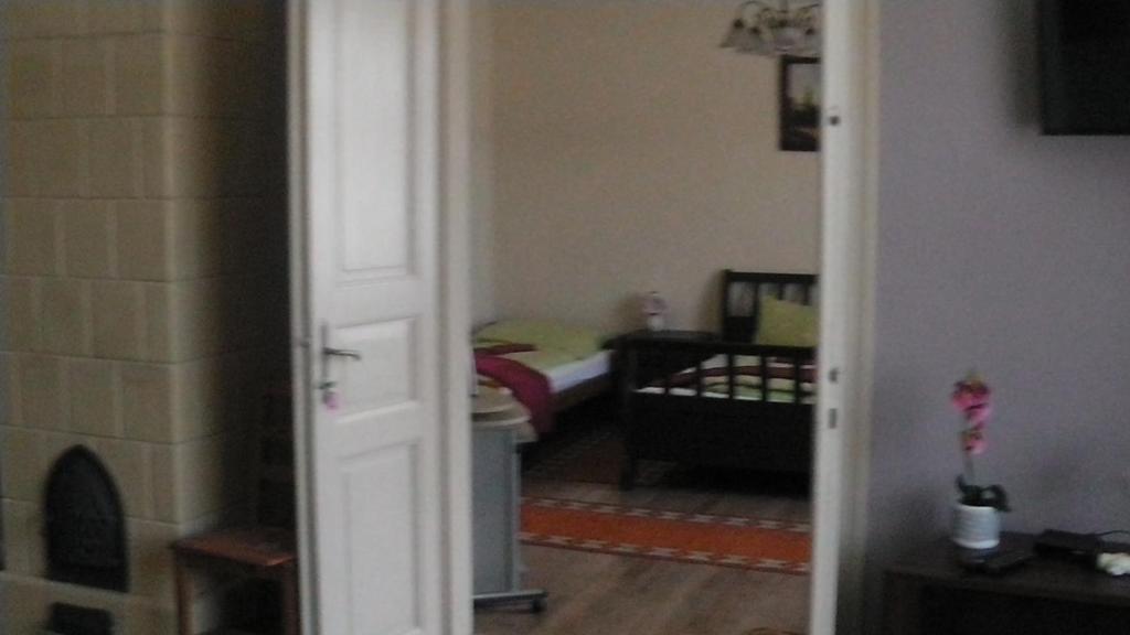 Postel nebo postele na pokoji v ubytování Vazsita ház