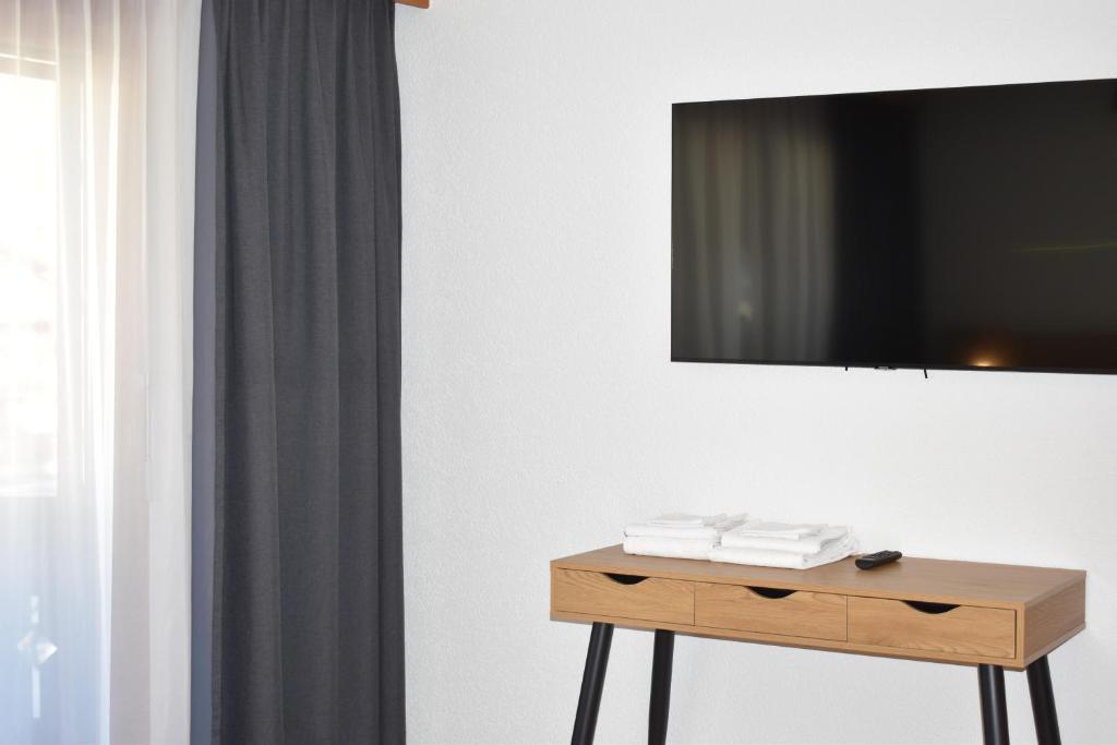 TV a/nebo společenská místnost v ubytování Appartementhaus Crystal