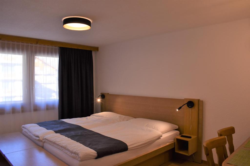 Postel nebo postele na pokoji v ubytování Appartementhaus Crystal