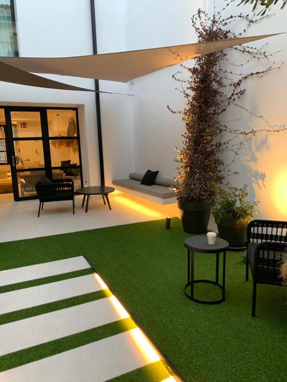 Vonkajšia záhrada v ubytovaní Aparthotel El Cargol