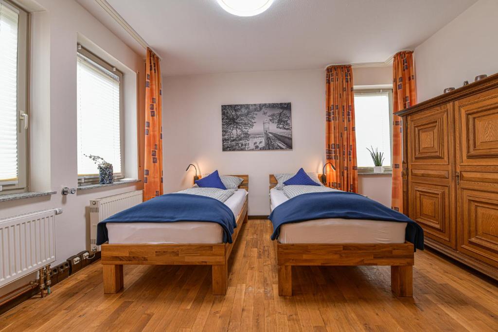 Postel nebo postele na pokoji v ubytování Ernst-Ludwig-Promenade
