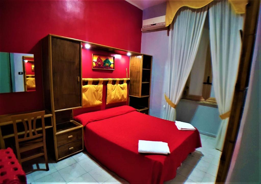 Letto o letti in una camera di Hotel Ginevra
