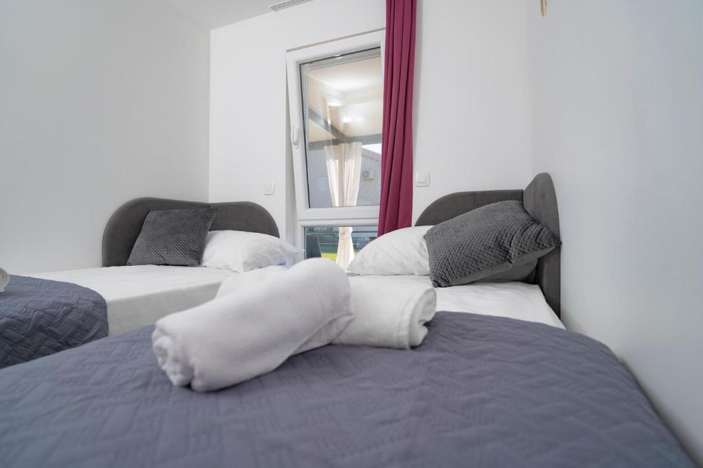 Postel nebo postele na pokoji v ubytování Adriatic Mobile Homes
