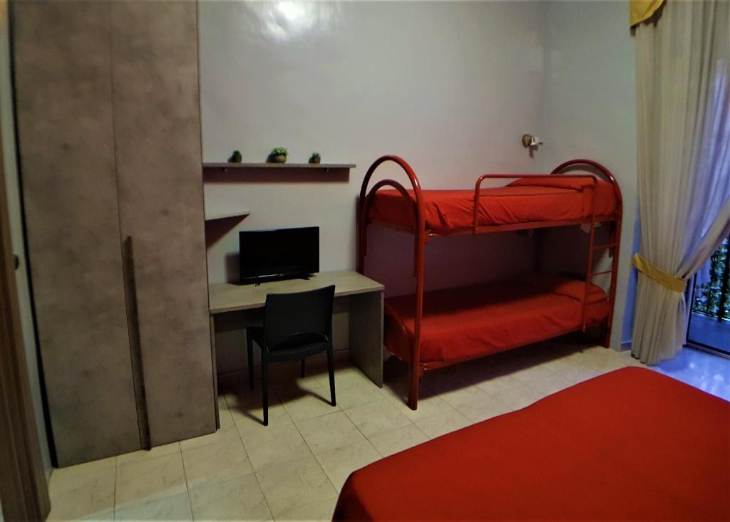 Letto o letti in una camera di Hotel Ginevra