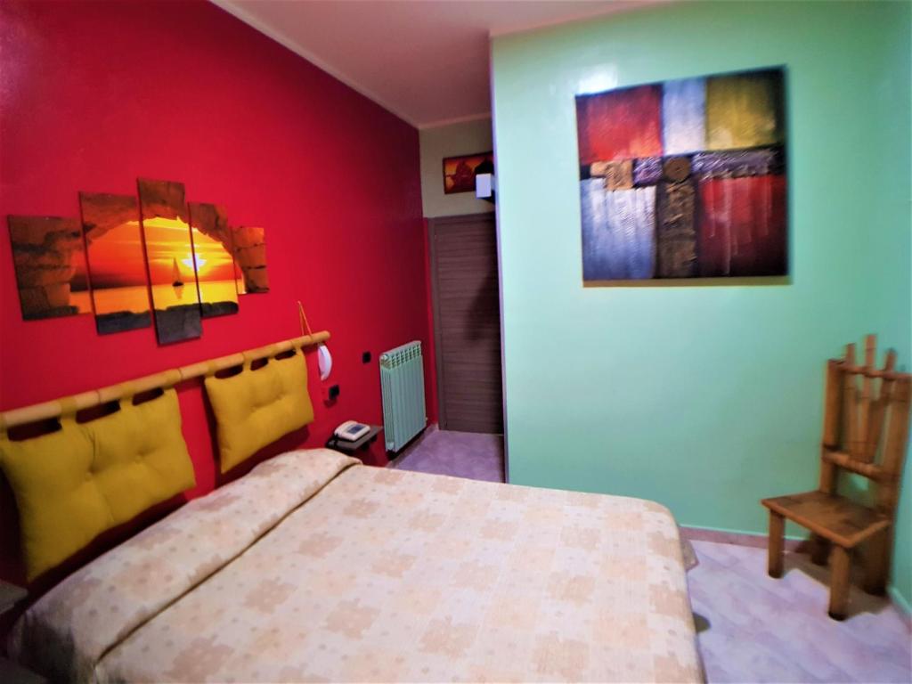Letto o letti in una camera di Hotel Ginevra
