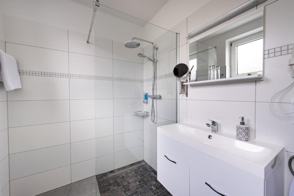 Koupelna v ubytování SOVA Hotel