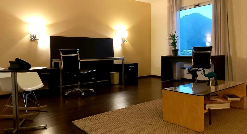 TV a/nebo společenská místnost v ubytování Fiesta Inn Leon