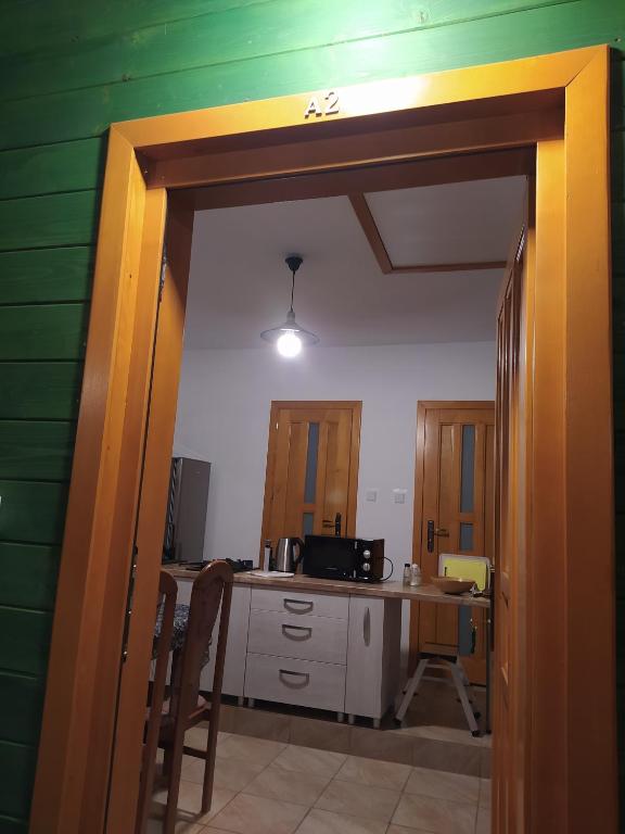 Kuchyň nebo kuchyňský kout v ubytování Pod Modrzewiami