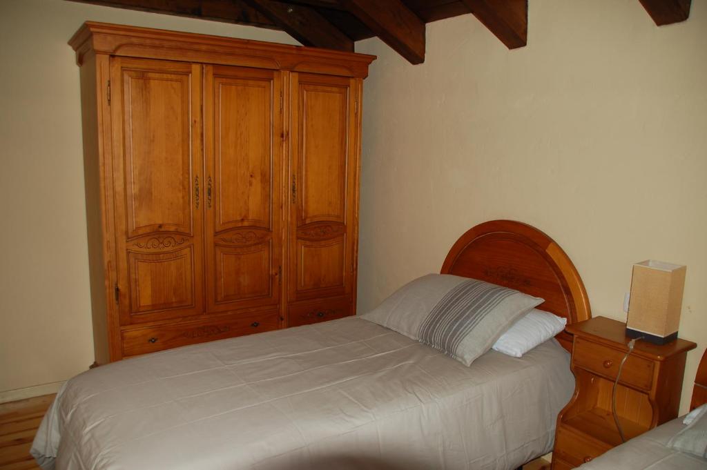 Postel nebo postele na pokoji v ubytování Hostal Casa Rosita