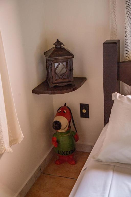 Cama ou camas em um quarto em Pousada Bob Pai & Bob Filho