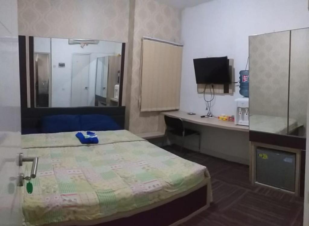 Кровать или кровати в номере Barata Hotel AR1