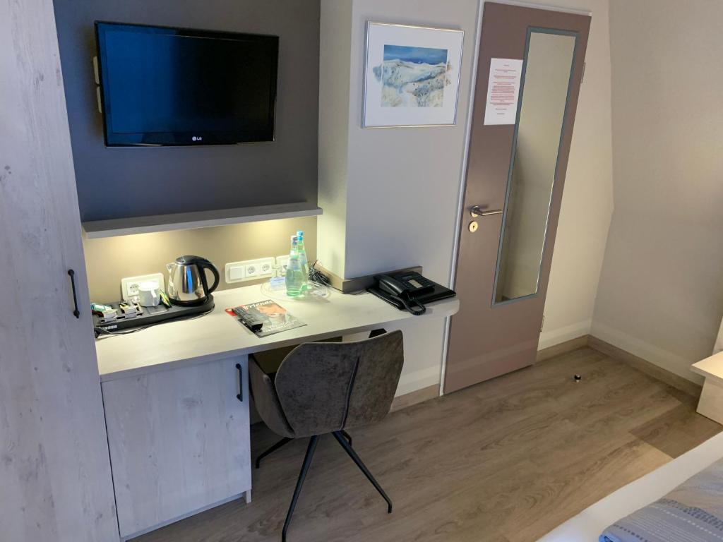 Kuchyň nebo kuchyňský kout v ubytování Apart Hotel Norden