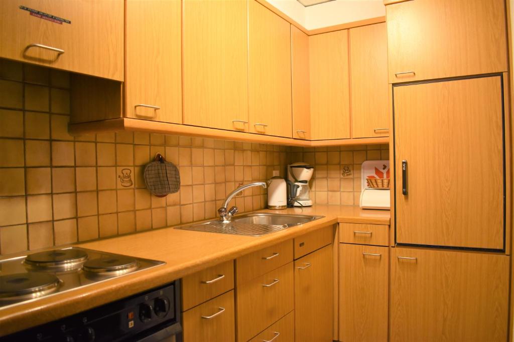 Kuchyň nebo kuchyňský kout v ubytování Appartementhaus Crystal