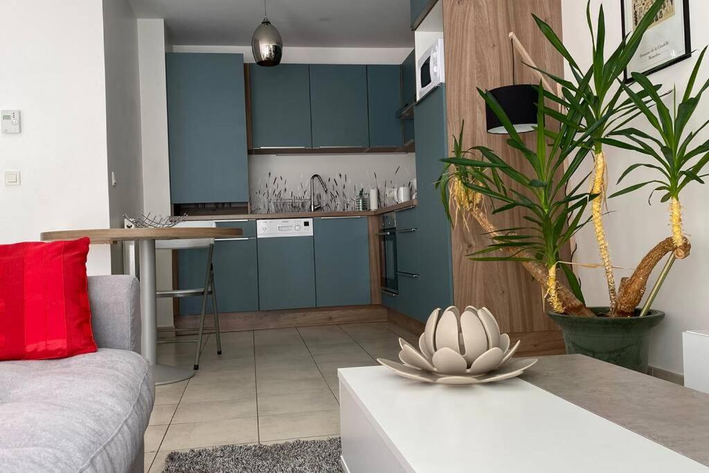Cuisine ou kitchenette dans l'établissement Cocon sur cour