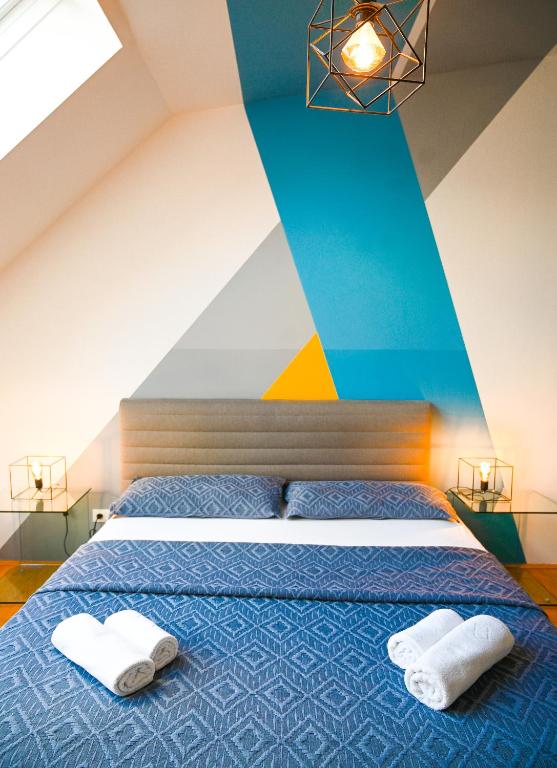 Łóżko lub łóżka w pokoju w obiekcie Backpacker Apartment Schönbrunn