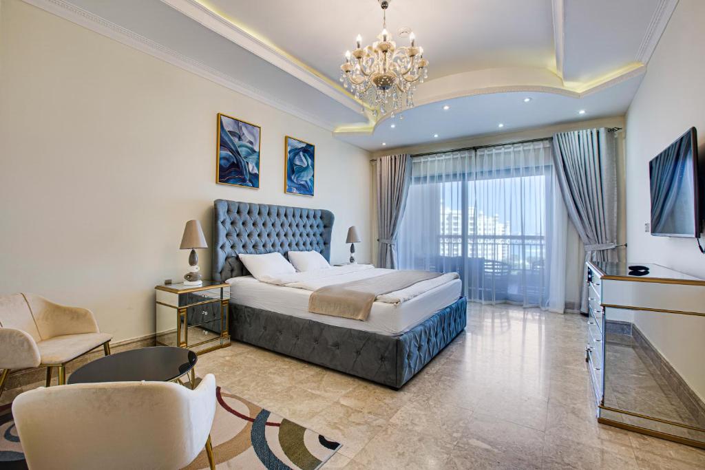 Postel nebo postele na pokoji v ubytování South & North Residence Palm Jumeirah