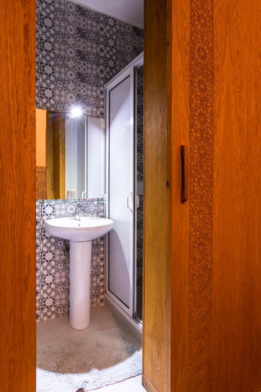 Koupelna v ubytování Hotel Toulousain