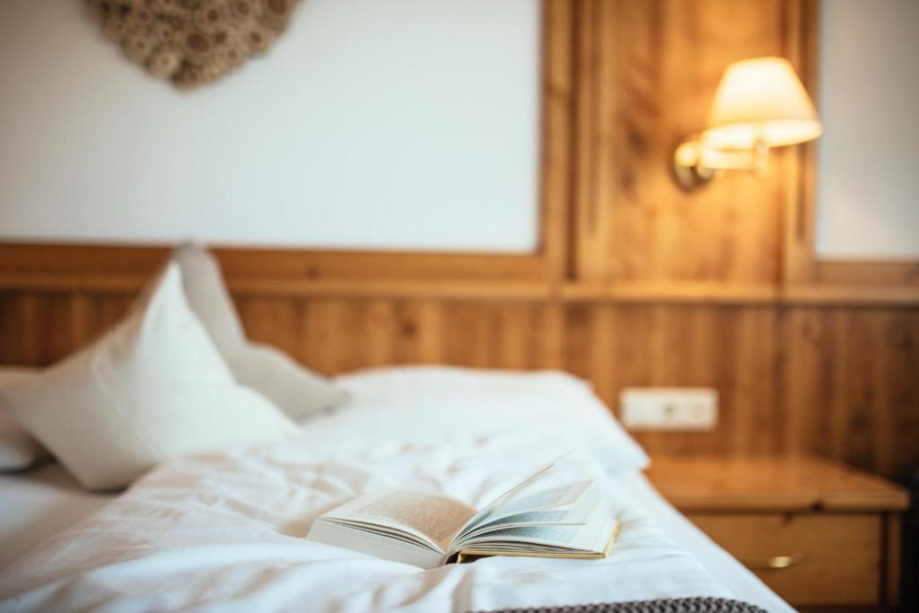 Postel nebo postele na pokoji v ubytování Tirolerhof