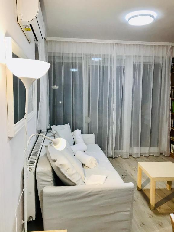 Posteľ alebo postele v izbe v ubytovaní Balaton BeachSide Apartman Siófok N1