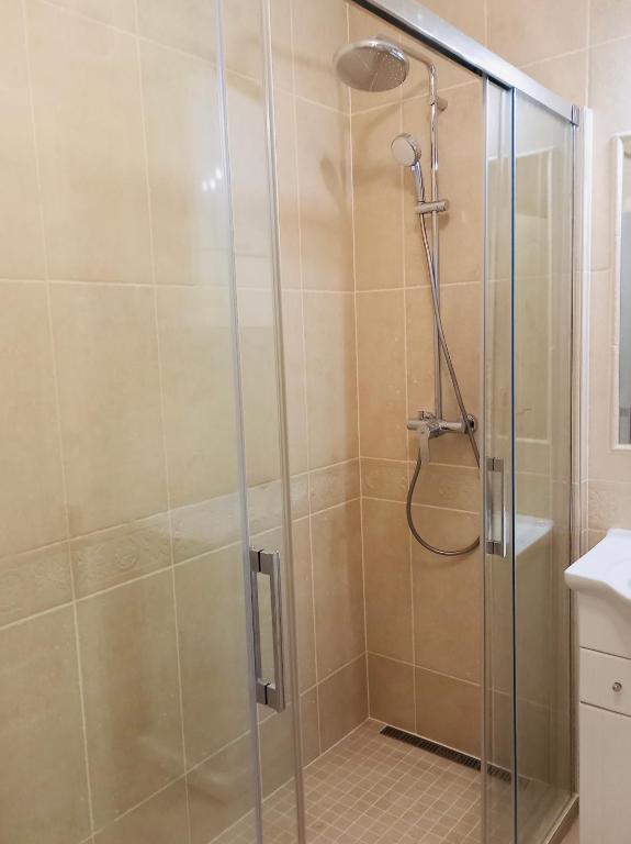 Kúpeľňa v ubytovaní Balaton BeachSide Apartman Siófok N1