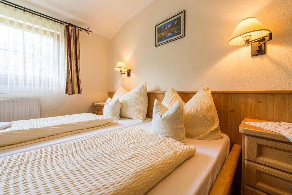 Postel nebo postele na pokoji v ubytování Landgasthof Bierfriedl